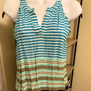 Great tank top that wraps around the neck and has a slight racer back.